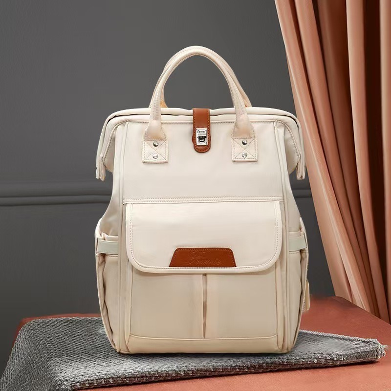 Mochila de fraldas de maternidade Oxford leve e elegante, grande capacidade para itens essenciais do bebê durante o Festival da Primavera